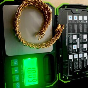 This is a solid, 14 karat gold bracelet